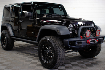 Black 2015 jk rubicon passenger front corner