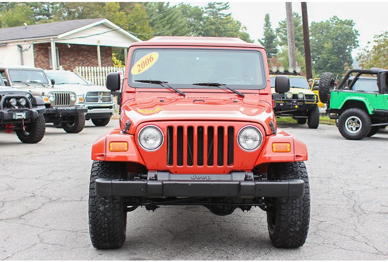 2006 Orange Jeep Wrangler Unlimited RubiTrux Conversion for Sale