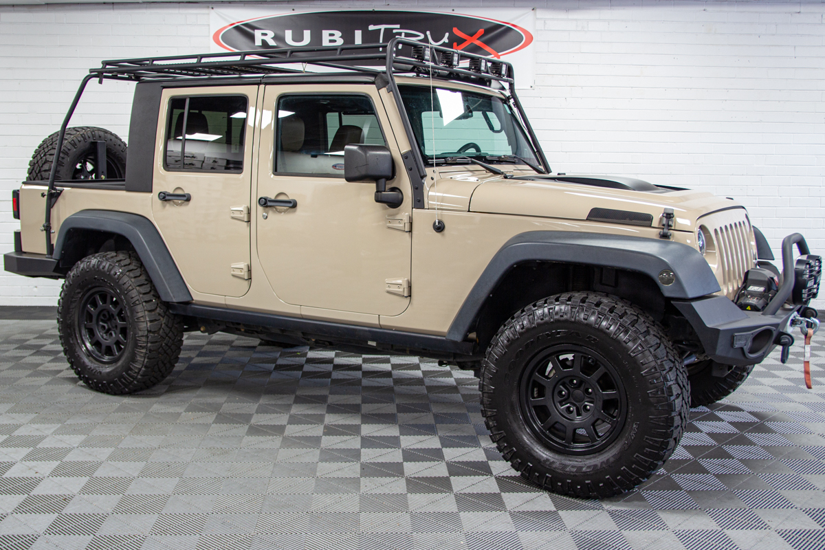 Pre-Owned 2014 Jeep Wrangler Rubicon Unlimited EX-T Mojave Sand