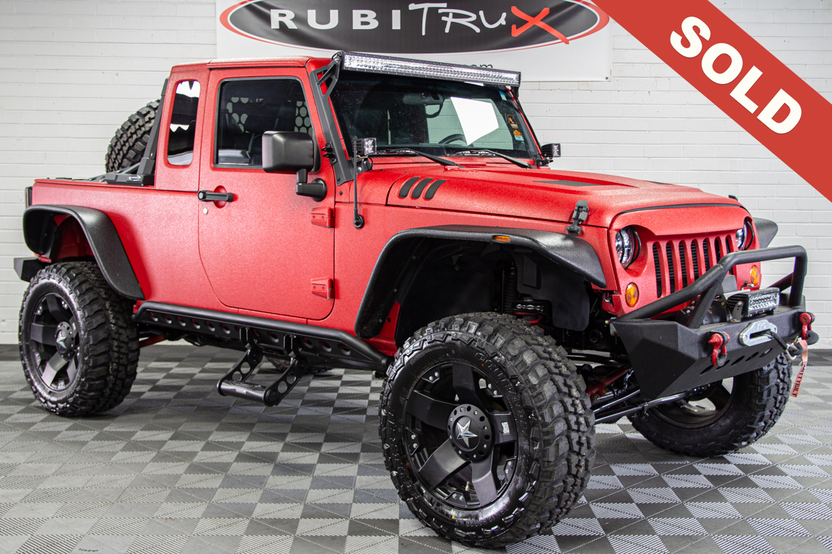 Pre-Owned Jeep Wrangler JK-8 Line-X Red